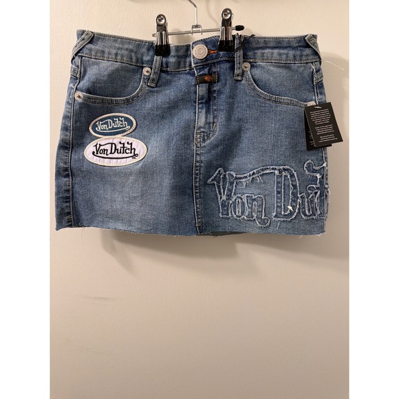 Von Dutch Dresses & Skirts - Von Dutch Y2K Denim Mini Skirt Medium Wash Logo Patches Wings NWT Size 1/25